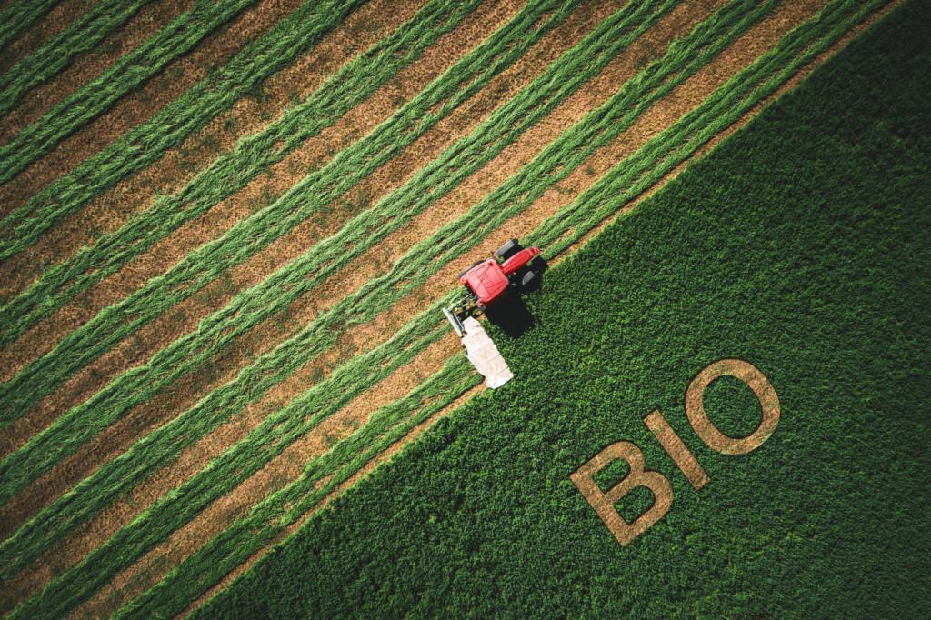 Bio concept and tactor mowing green field